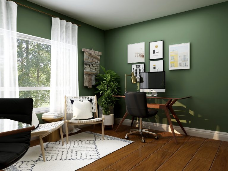 escritorio y ordenador en habitacion verde